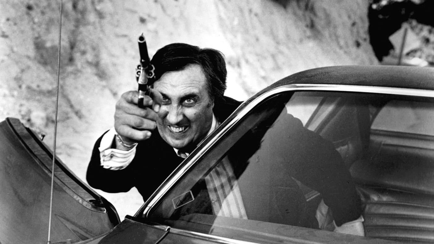 Backdrop of The Outfit