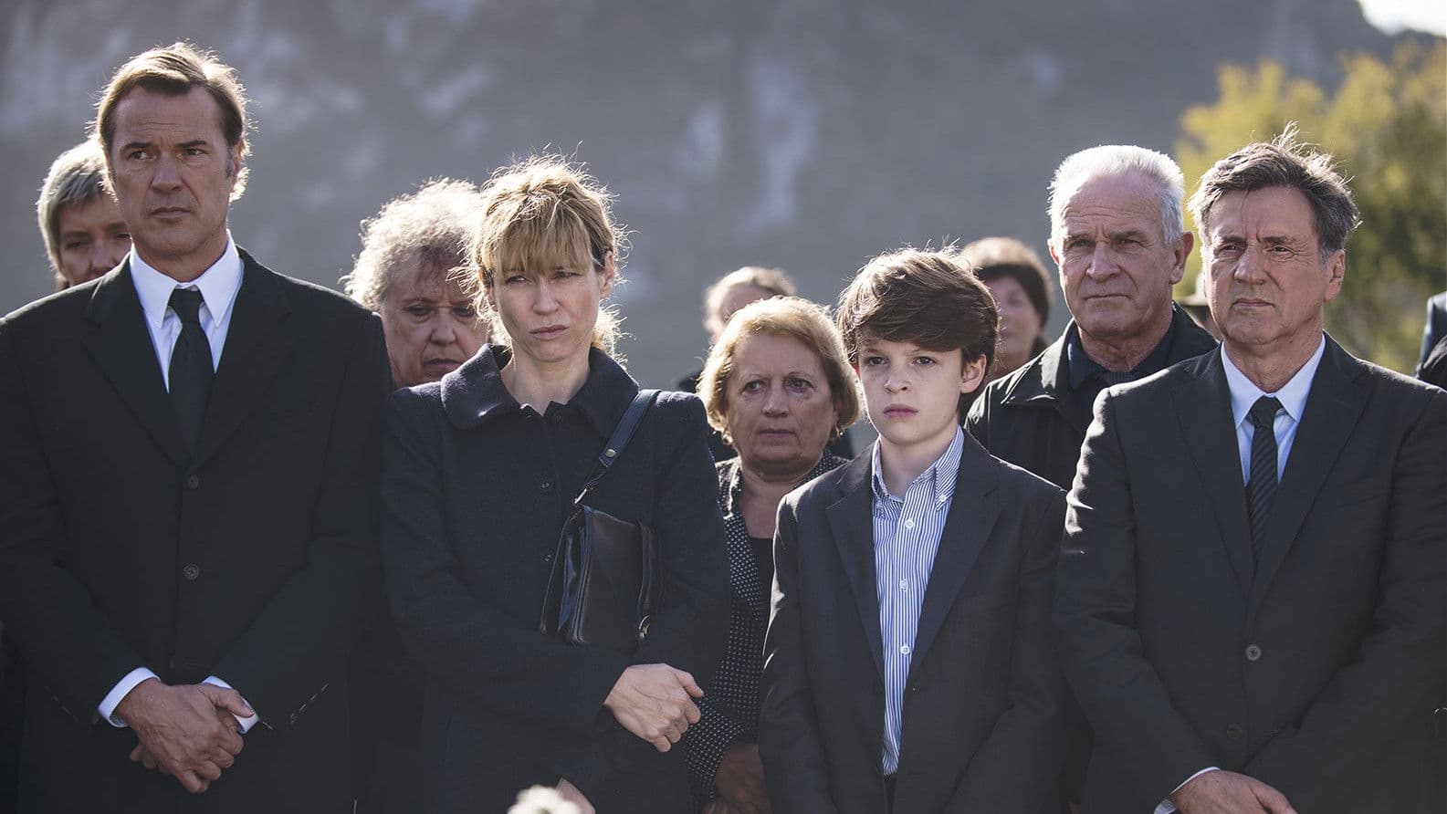 Backdrop of In Her Name